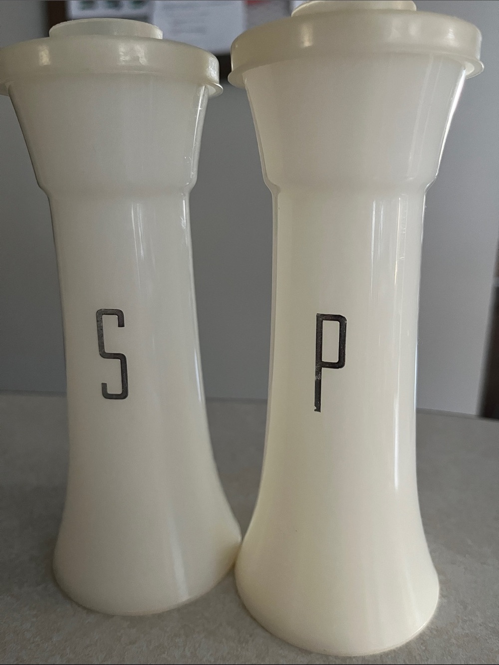 Tupperware Ivory Salt and Pepper Shakers